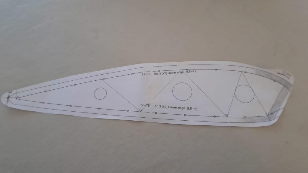 Printed paper rib pattern with 45-degree diagonal inlet and cross-ports